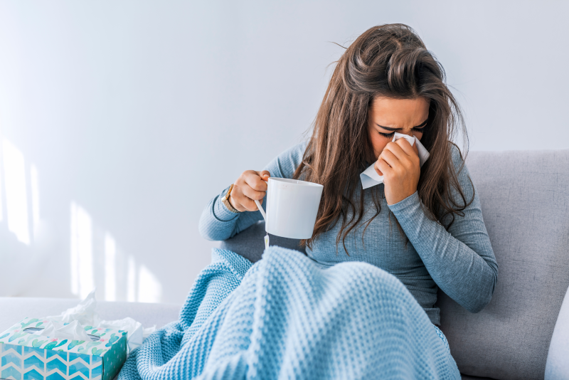 What happens in our body during the flu according to TCM, is it necessary to get vaccinated?